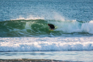 Riding a barrel at Appletree surfboard