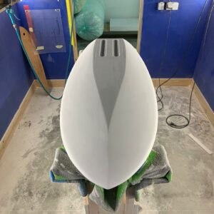 Blank Appletree Pro-Foil kiteboard in shaping bay factory